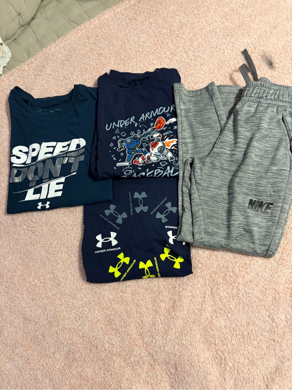 3 Under armor shirts (YS) and grey nike sweatpants also youth small